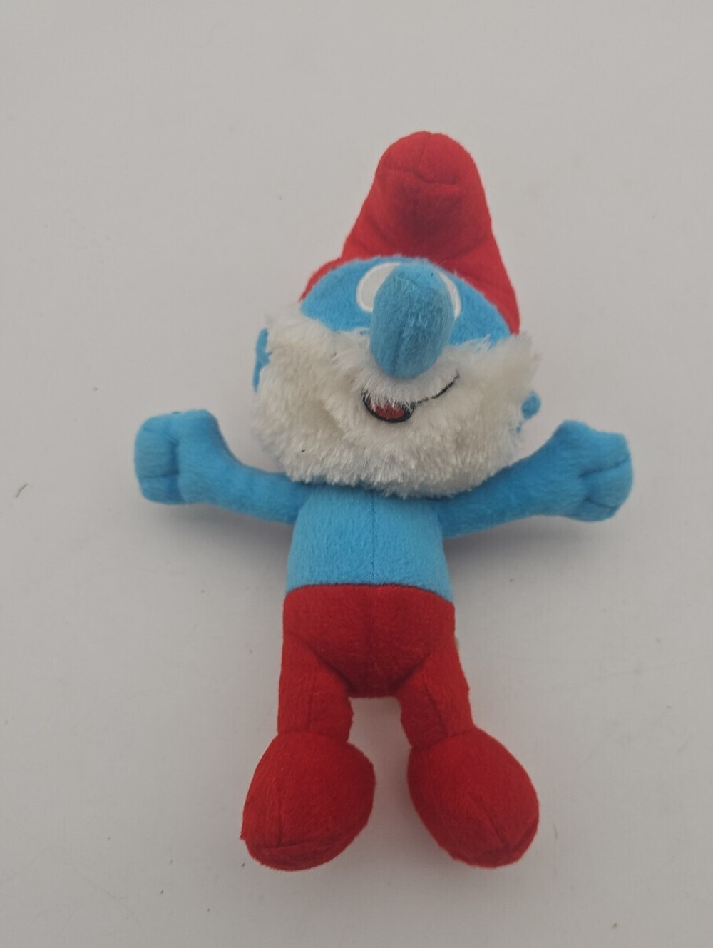 Authentic 10" Papa Smurf 2013 plush featuring iconic red hat and white beard.